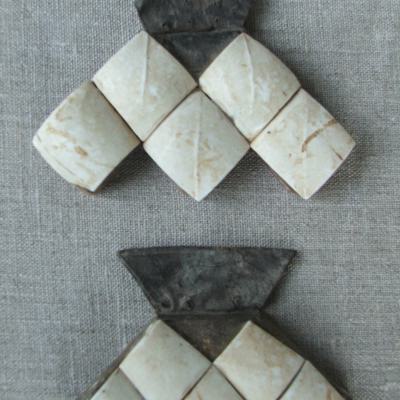 Two beautiful pieces of jewelry of Touareg origin. Made of leather and cut shell. Also called a 