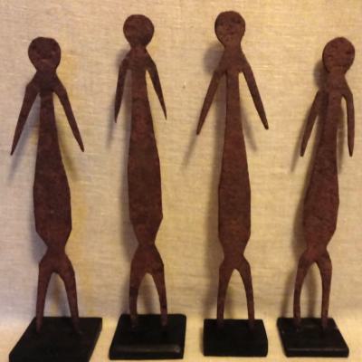 Four flat iron fetishes, used on traditional altars. Iron has a magical property. H. 31 cm. Moba, Togo.