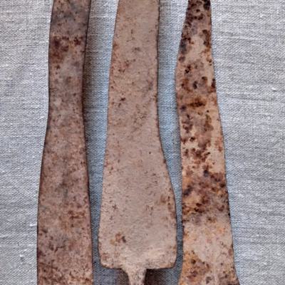 Three iron knife-blades, H. 23-24 cm. Late Tellem or Early Dogon. Mali.