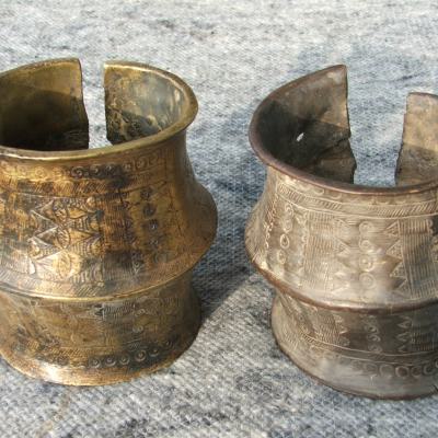 Two large bronze anklets worn by Fulani women, H.14cm.,Niger