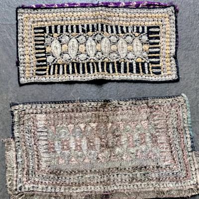Two caps,worn by young women, with beautiful intricate embroideries with silverthread. Dim. 20 x 41 and 25 x 47 cm. Sana'a region. Yemen.