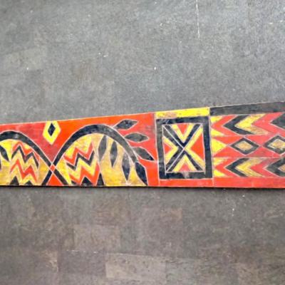 Brightly painted bench-back. From the period of Haile Selassi ( pre-1974). Ambo-region. West-Ethiopia. l.191 cm.